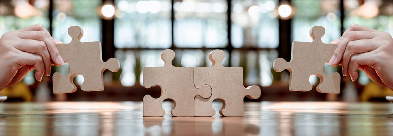 Close-up of hand holding wood