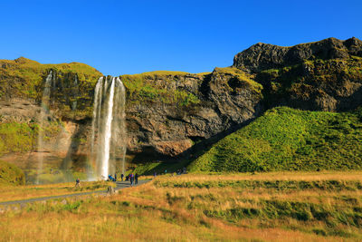 Scenic view of land against clear sky