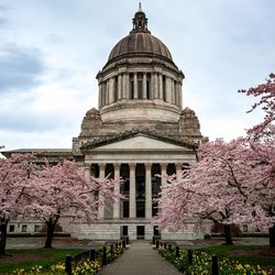 Low angle view of building against cloudy sky