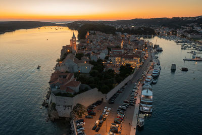 High angle view of sea against sky during sunset