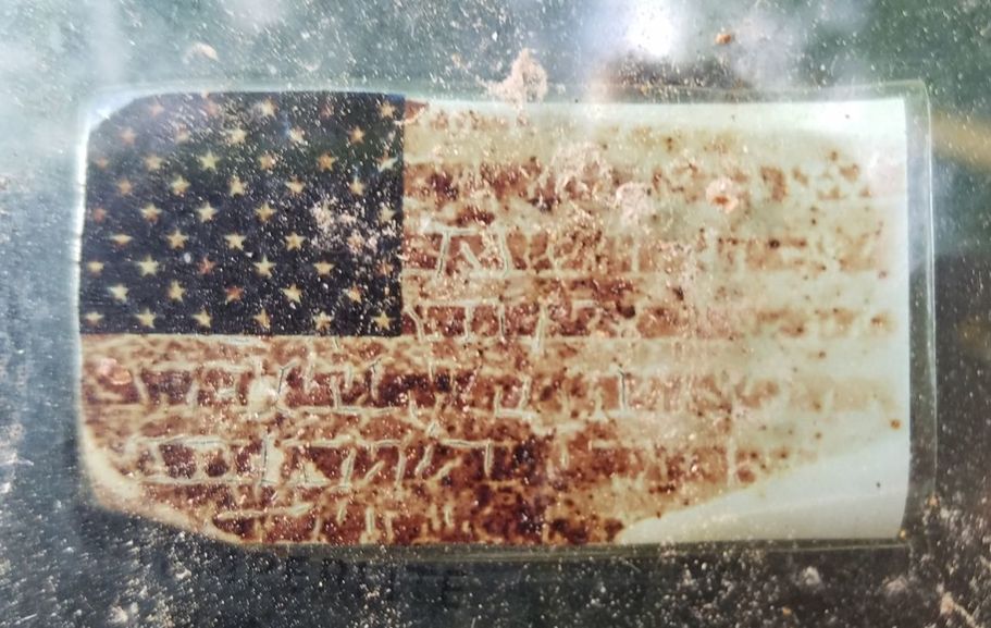 Old U.S. flag faded car sticker