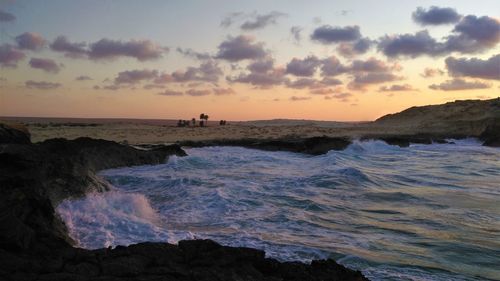 Scenic view of sea against sky during sunset