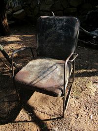 Close-up of abandoned chairs