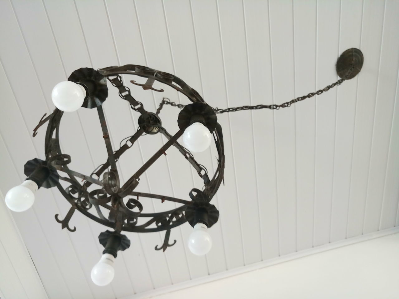LOW ANGLE VIEW OF ELECTRIC LAMP ON CEILING