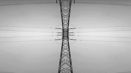 Low angle view of electricity pylon