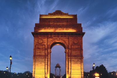 View of india gate by night, new delhi, india.