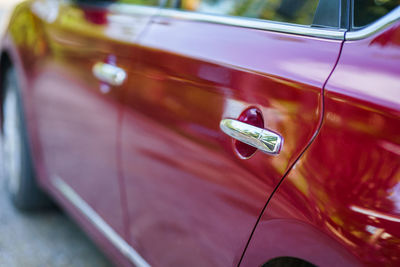 Close-up of car on street