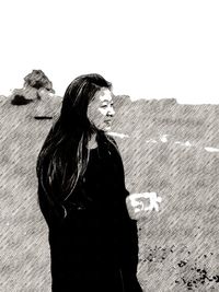 Shadow of person standing on field