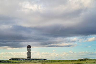 Built structure on field against sky