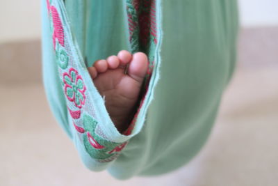 Close-up of baby foot in hammock