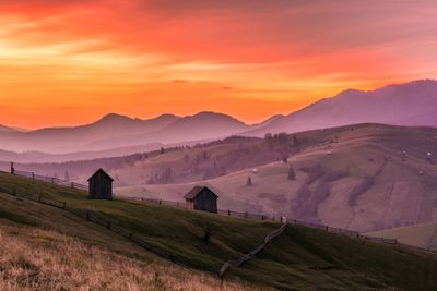 Scenic view of landscape against sky during sunset