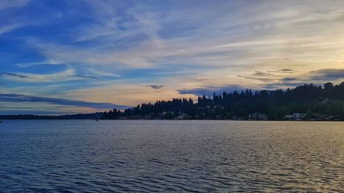 Scenic view of sea against sky at sunset