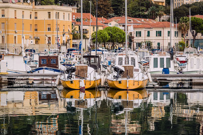 View of boats moored in city