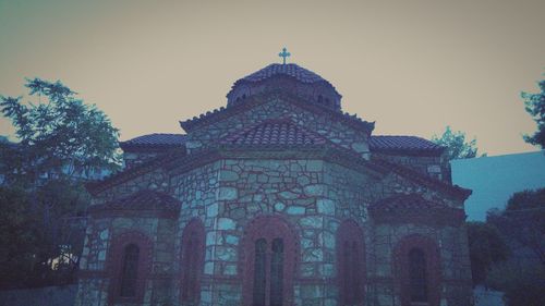 Low angle view of built structure against clear sky