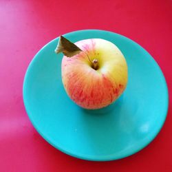 High angle view of apple on table