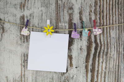 Close-up of clothes hanging on wall