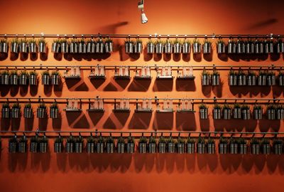 Multi colored bottles on shelf
