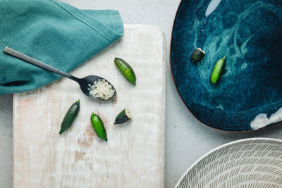 High angle view of fruits on cutting board