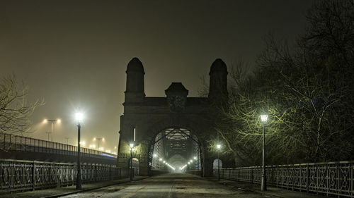 Illuminated street light at night