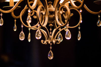 Close-up of christmas lights against black background