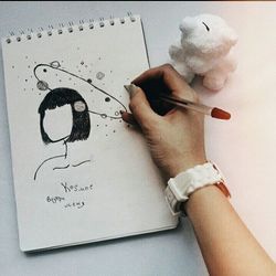 Close-up of human hand holding paper