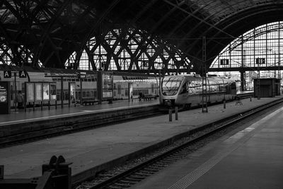 People walking on railroad station