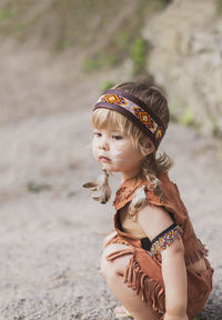 Cute baby dressed in traditional native american costume 