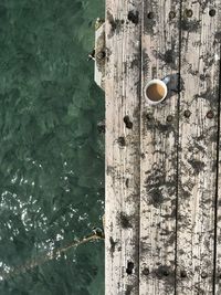 High angle view of eggs in sea during sunny day