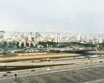 Aerial view of cityscape against sky