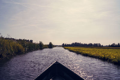 Scenic view of river against sky