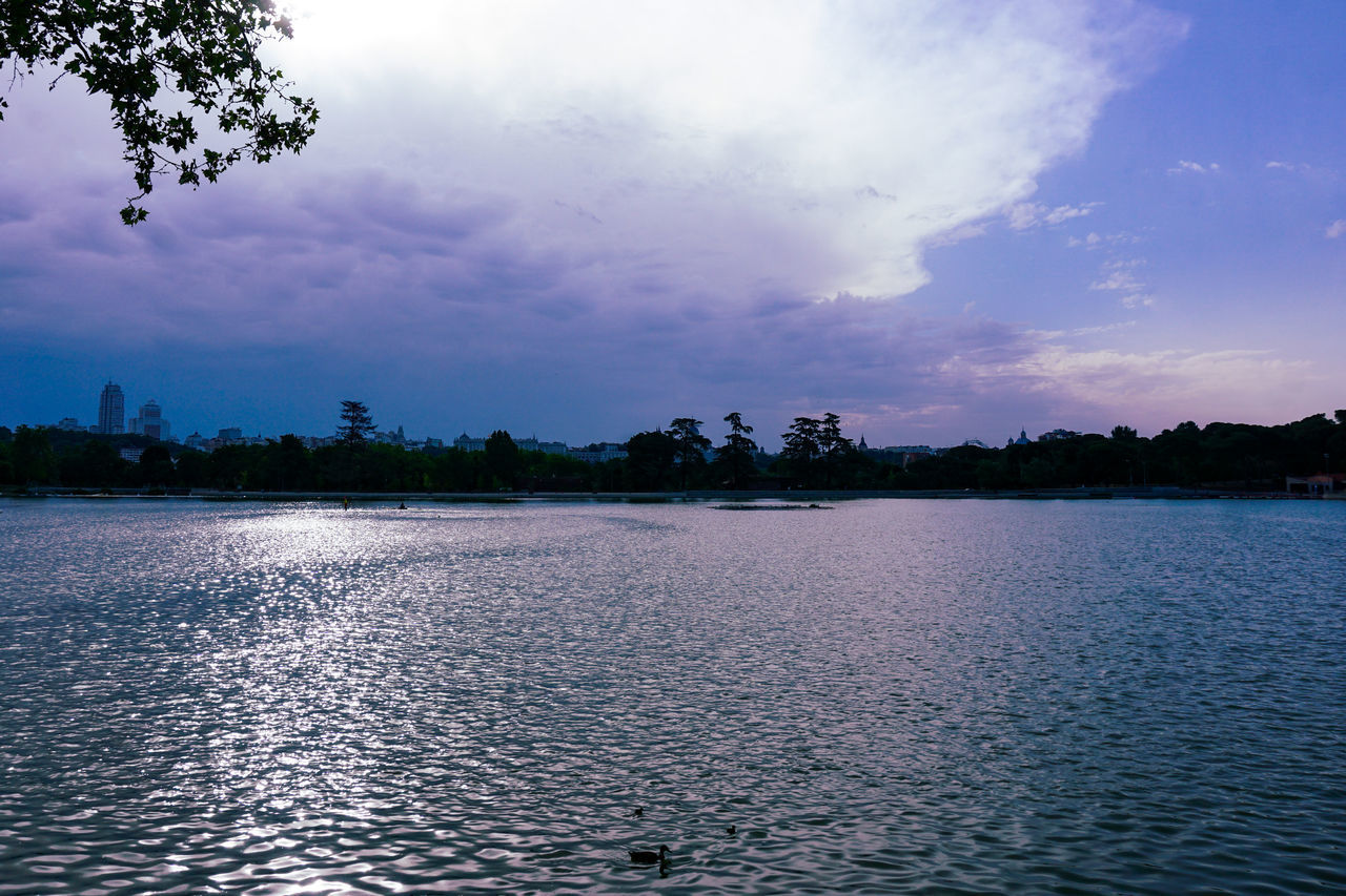 SCENIC VIEW OF LAKE AT SUNSET