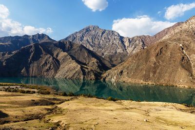 Panoramic view of lake and mountains against sky