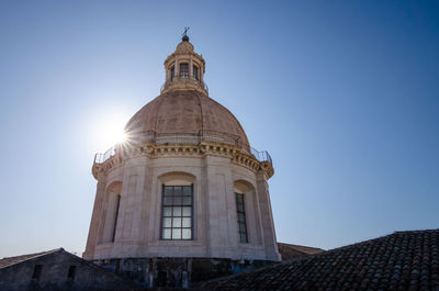 Low angle view of building against blue sky