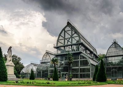 View of traditional building against cloudy sky