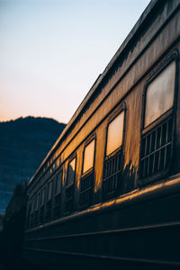 Train against sky at sunset