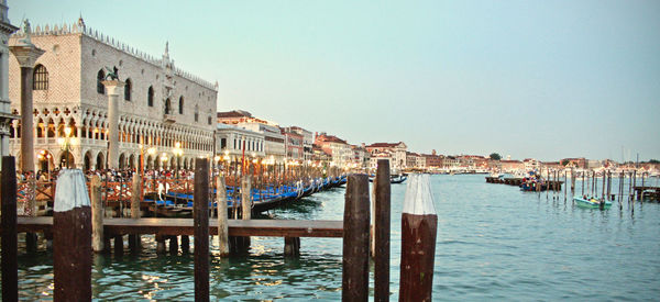 View of buildings in city against clear sky