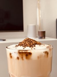 Close-up of coffee cup on table