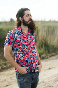 Young man standing on land