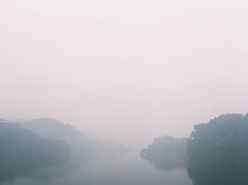 Scenic view of mountains during foggy weather