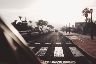 Road in city against sky