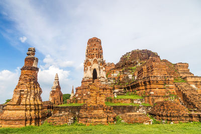 Old temple building against sky