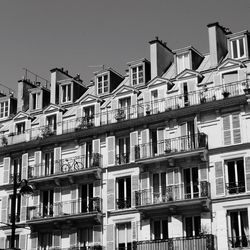 Low angle view of residential building against clear sky