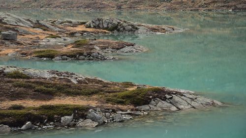 Scenic view of lake and rock formation