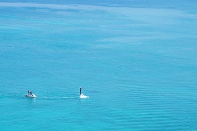 High angle view of ship sailing in sea