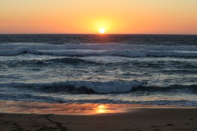 Dramatic sky over sea during sunset