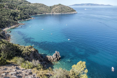 High angle view of bay against clear sky