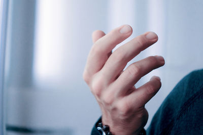 Close-up of person hand with tattoo