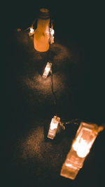 High angle view of illuminated light bulbs