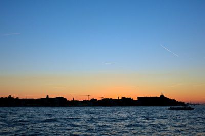 Scenic view of sunset over river