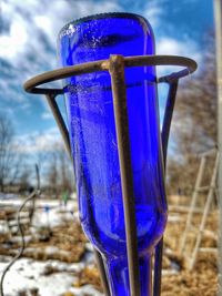 Close-up of blue water against sky